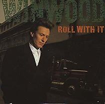 Watch Steve Winwood: Roll with It