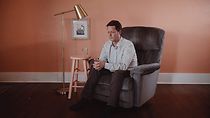 Watch Man Sitting in Chair