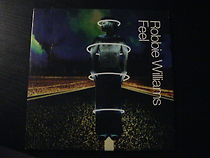 Watch Robbie Williams: Feel