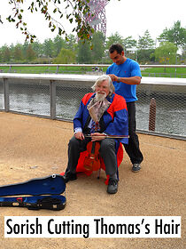 Watch Sorish Cutting Thomas's Hair