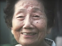 Watch Ni tsutsumarete (Short 1992)