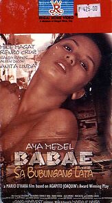 Watch Babae sa bubungang lata