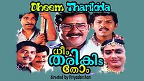 Watch Dheem Tharikida Thom