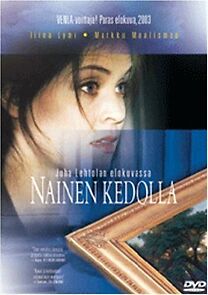 Watch Nainen kedolla